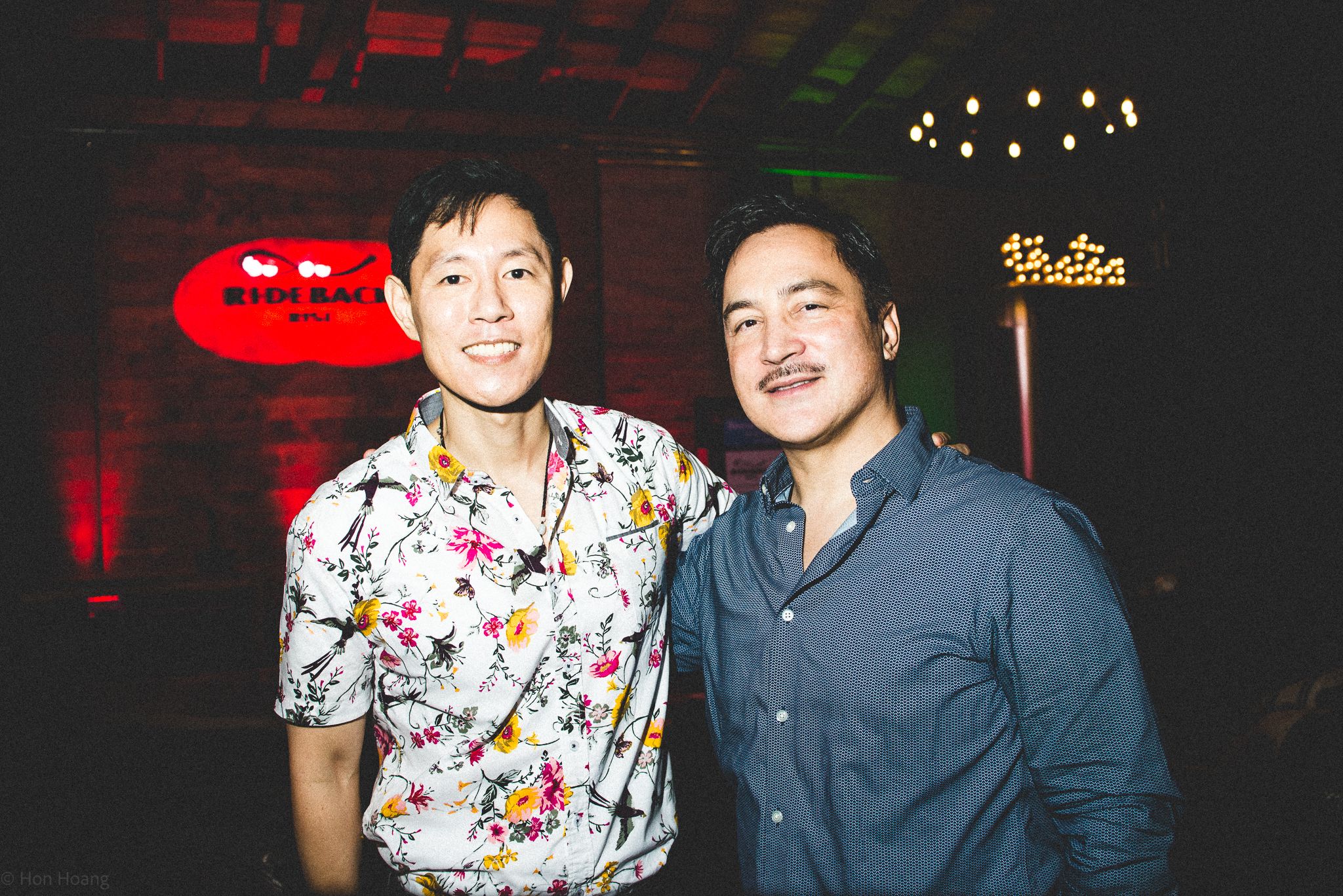 Two guys standing next to each other for a photo.